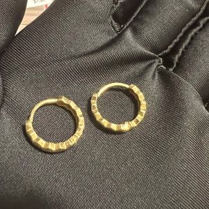 Brand new 18K Saudi gold Huggie earring